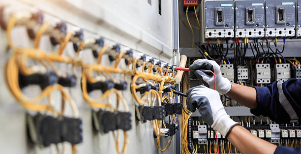 Professional Electrician technician working in Fort Lewis, WA